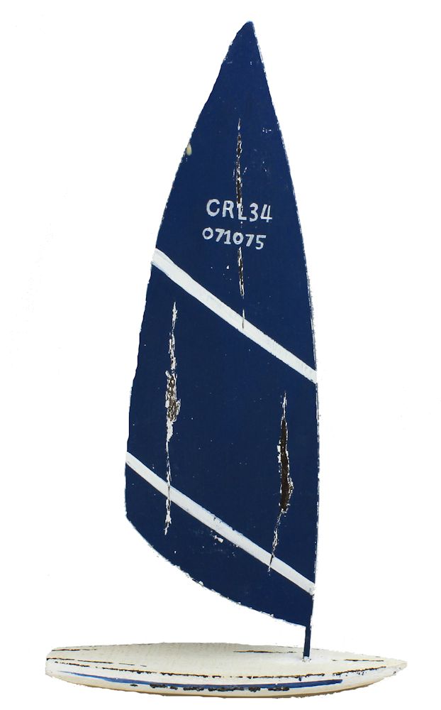 RC085-blue-surfboard-with-sail-figurine 17.75" Wood and Tin Sailboat Blue and White Figure - Image 1