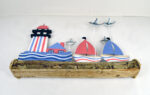 Lighthouse with Tin Sailboats and Seagulls on Wooden Log Base - Image 4